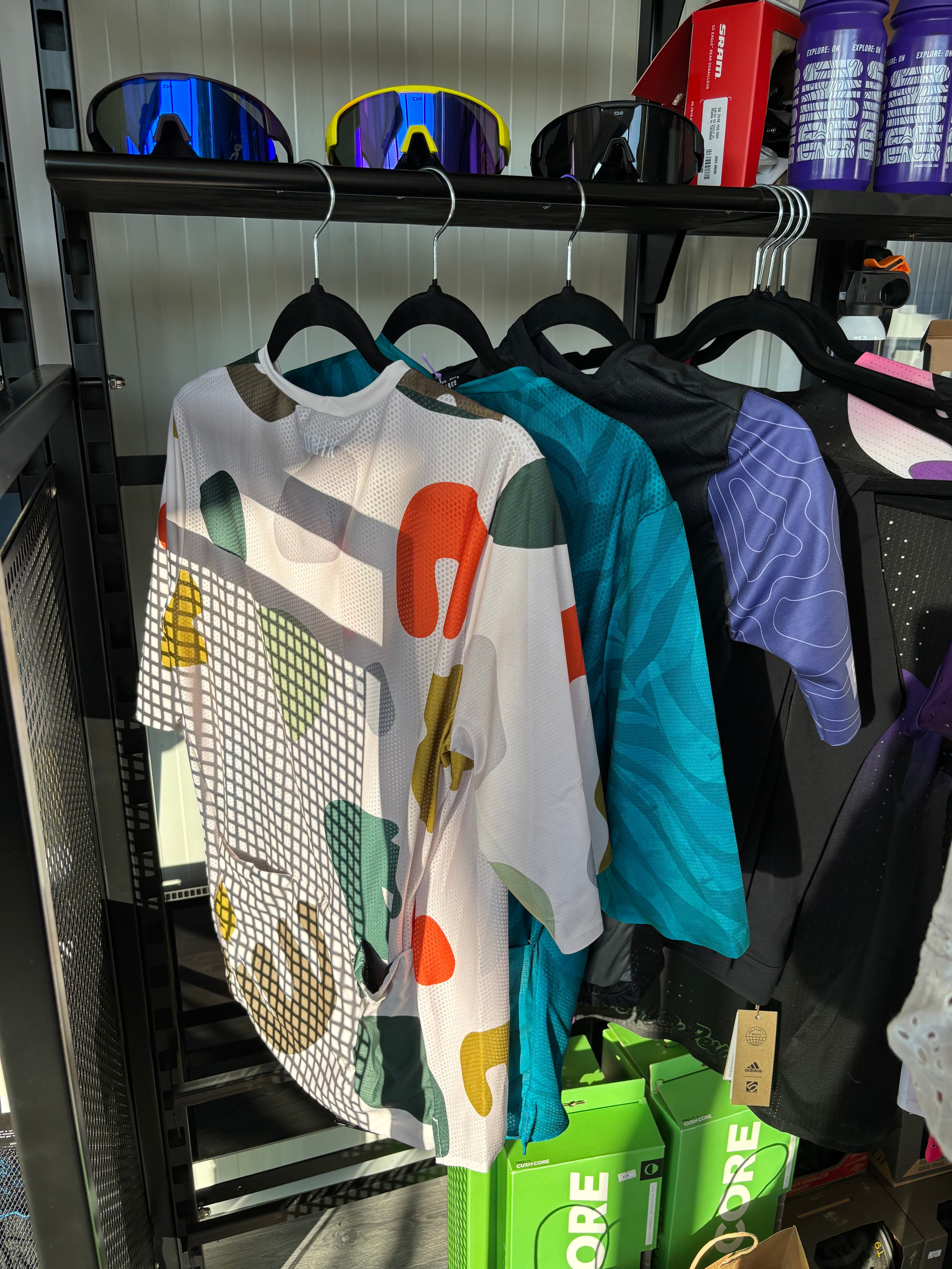 Bruno Cycling products on a rack in the store.