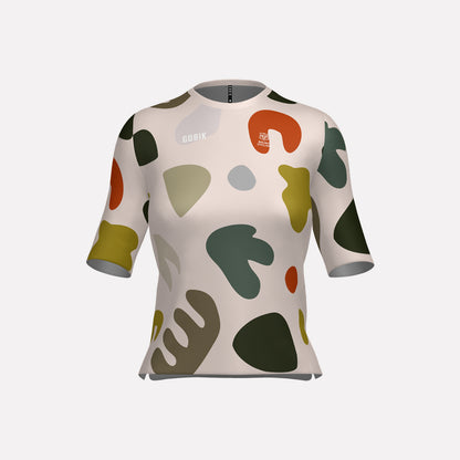 A women's cycling jersey with a geometric pattern in various earthy tones and a round neckline.