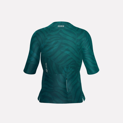 A women's cycling jersey in teal color with a nature pattern and short sleeves.